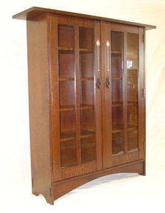 Gustav Stickley Harvey Ellis inspired two door bookcase with inlaid doors.